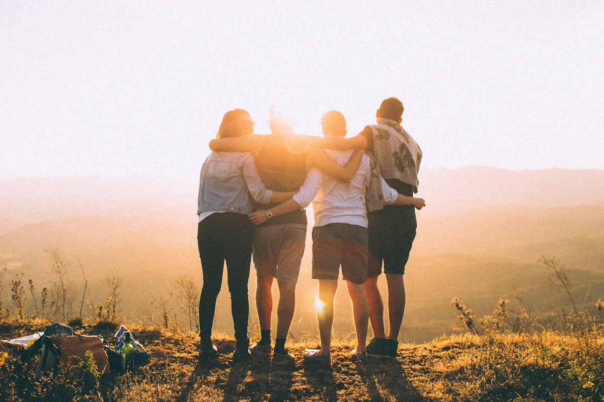 Friends together at sunset